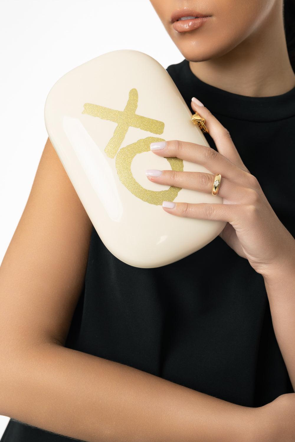 ELINA PLUS XO CLUTCH-LTSNDGLD-O/S-HANDBAGCLUTCHES-JEFFREY LEVINSON