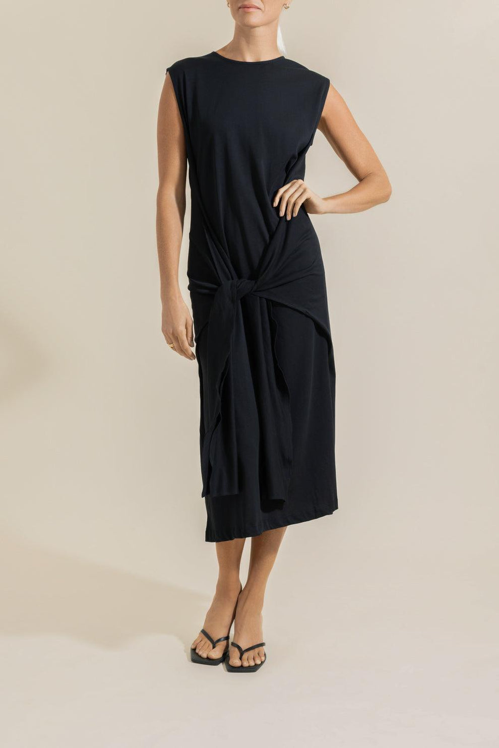 toteme dress Long-Sleeve Slouch Waist Maxi - Black offering an effortless drape and a flowy silhouette Slouch Waist gathered wool-crepe maxi