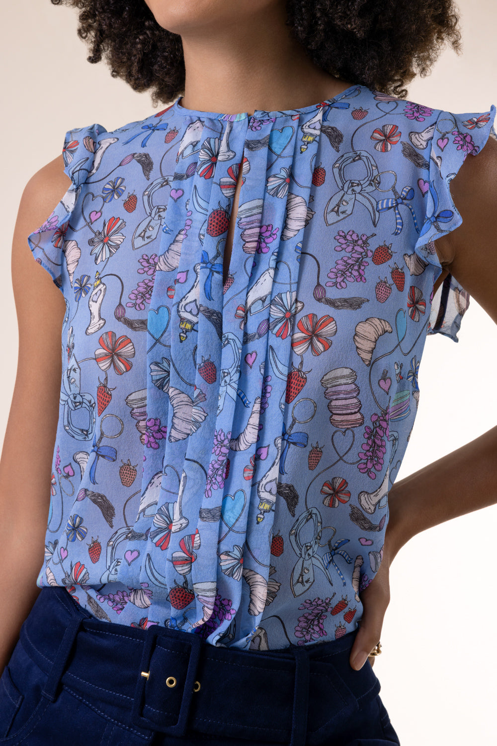 Perfume Print Sleeveless Blouse