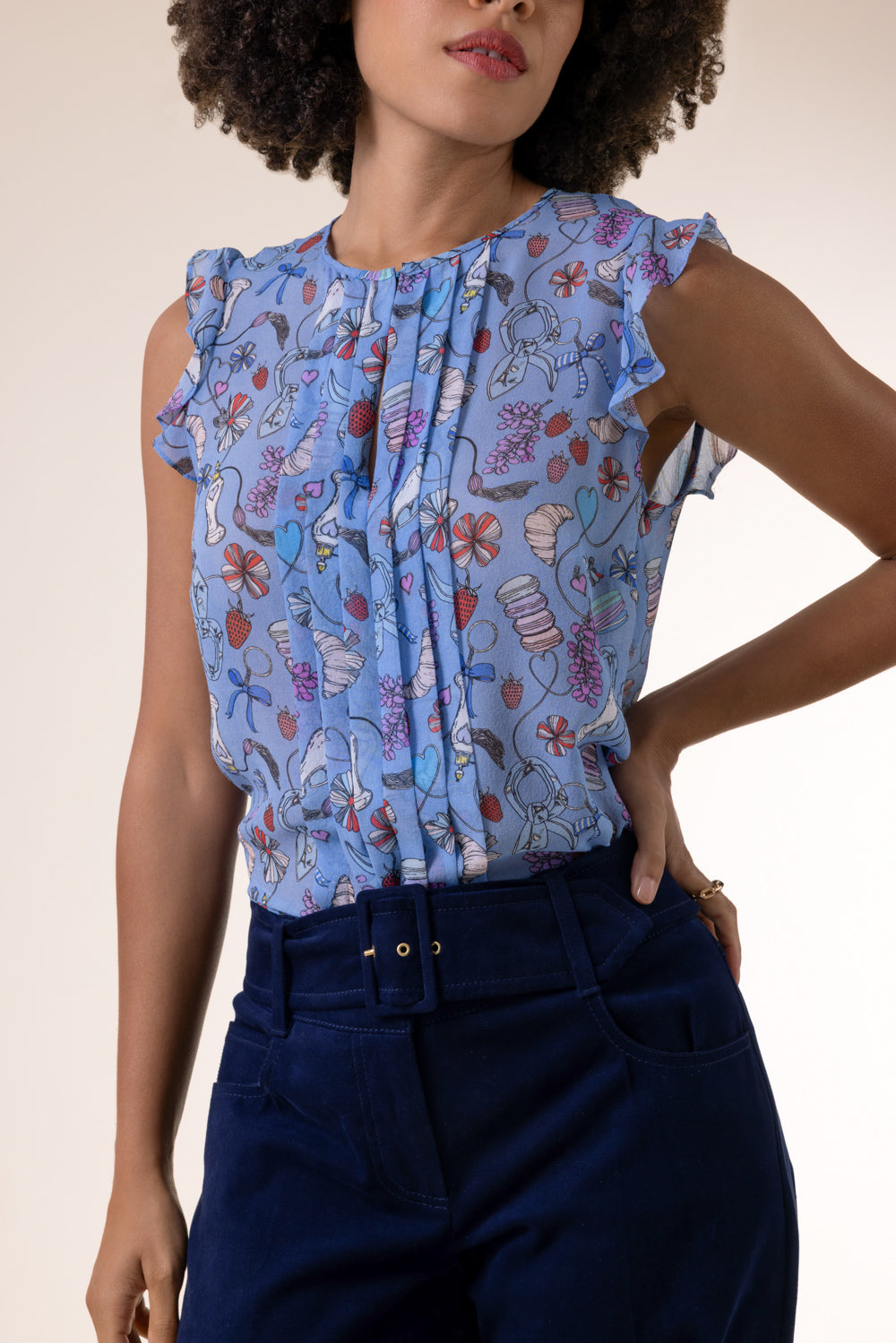 Perfume Print Sleeveless Blouse