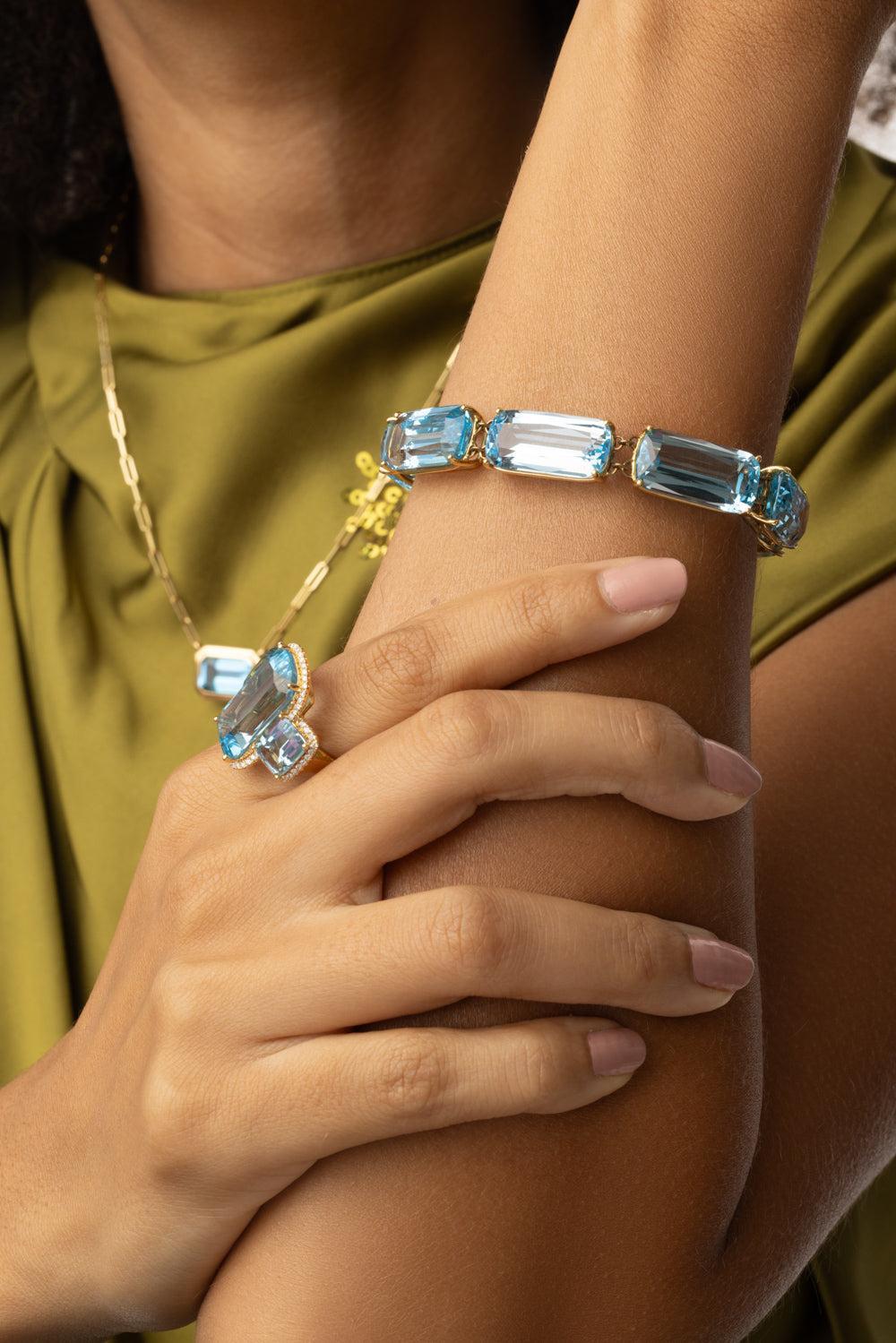 Blue Topaz Single Line Gossip Bracelet-YELLOW GOLD-6.5-JEWELRYFINE JEWELBRACELET O-GOSHWARA