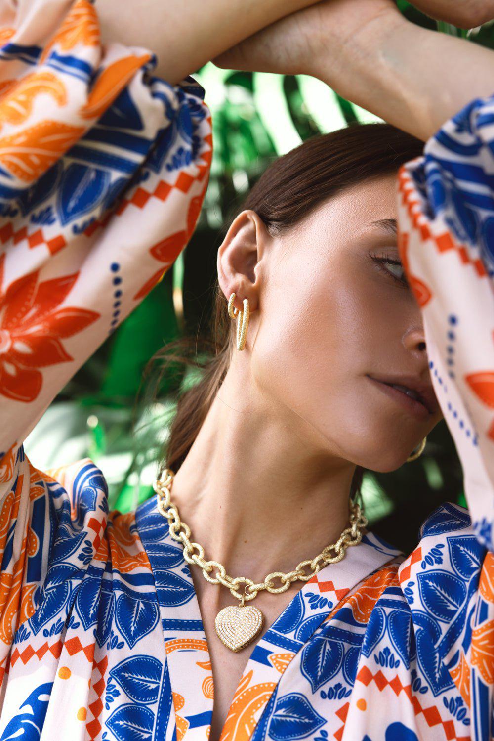 Florentine Finish Large Oval Hoop Earrings | CAROLINA BUCCI